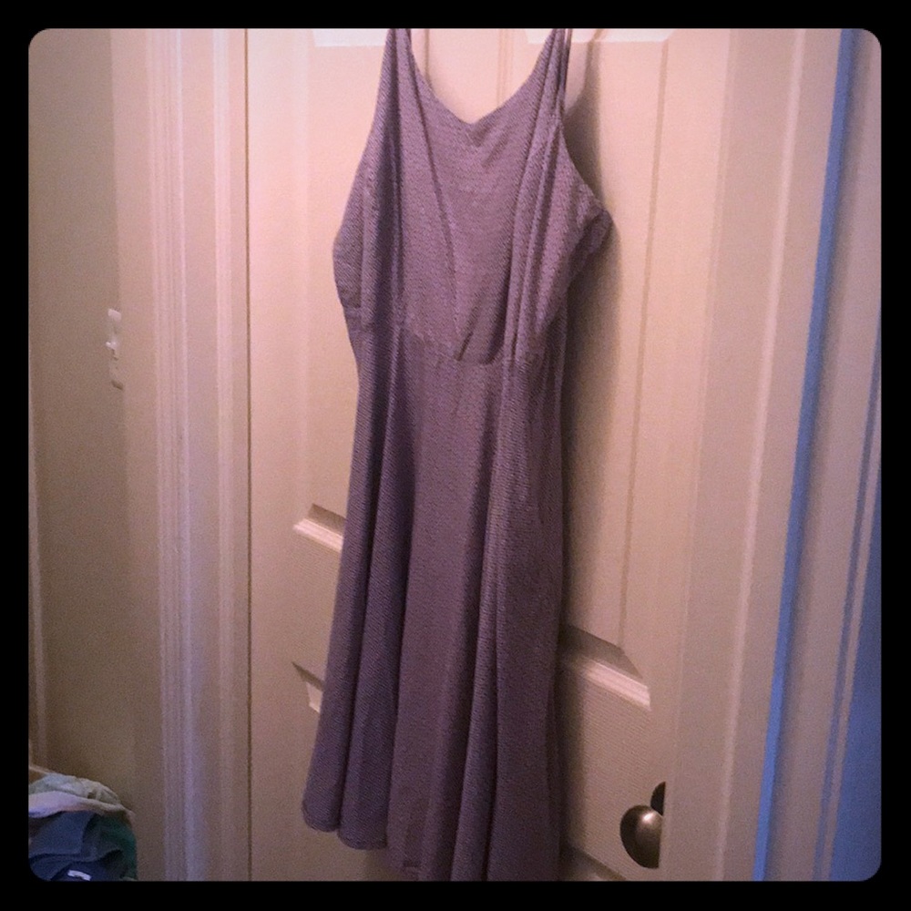 Purple dress with diamond design.